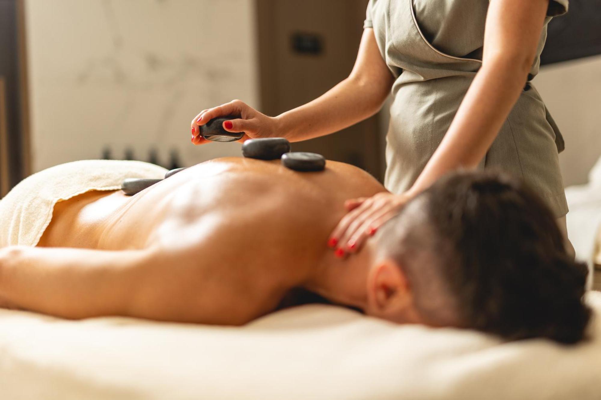 Hilton Rijeka Costabella Beach Resort And Spa Exterior photo Hot stone massage