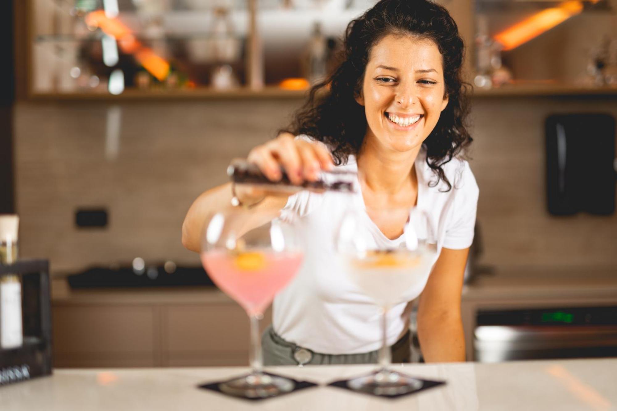 Hilton Rijeka Costabella Beach Resort And Spa Exterior photo A bartender at work