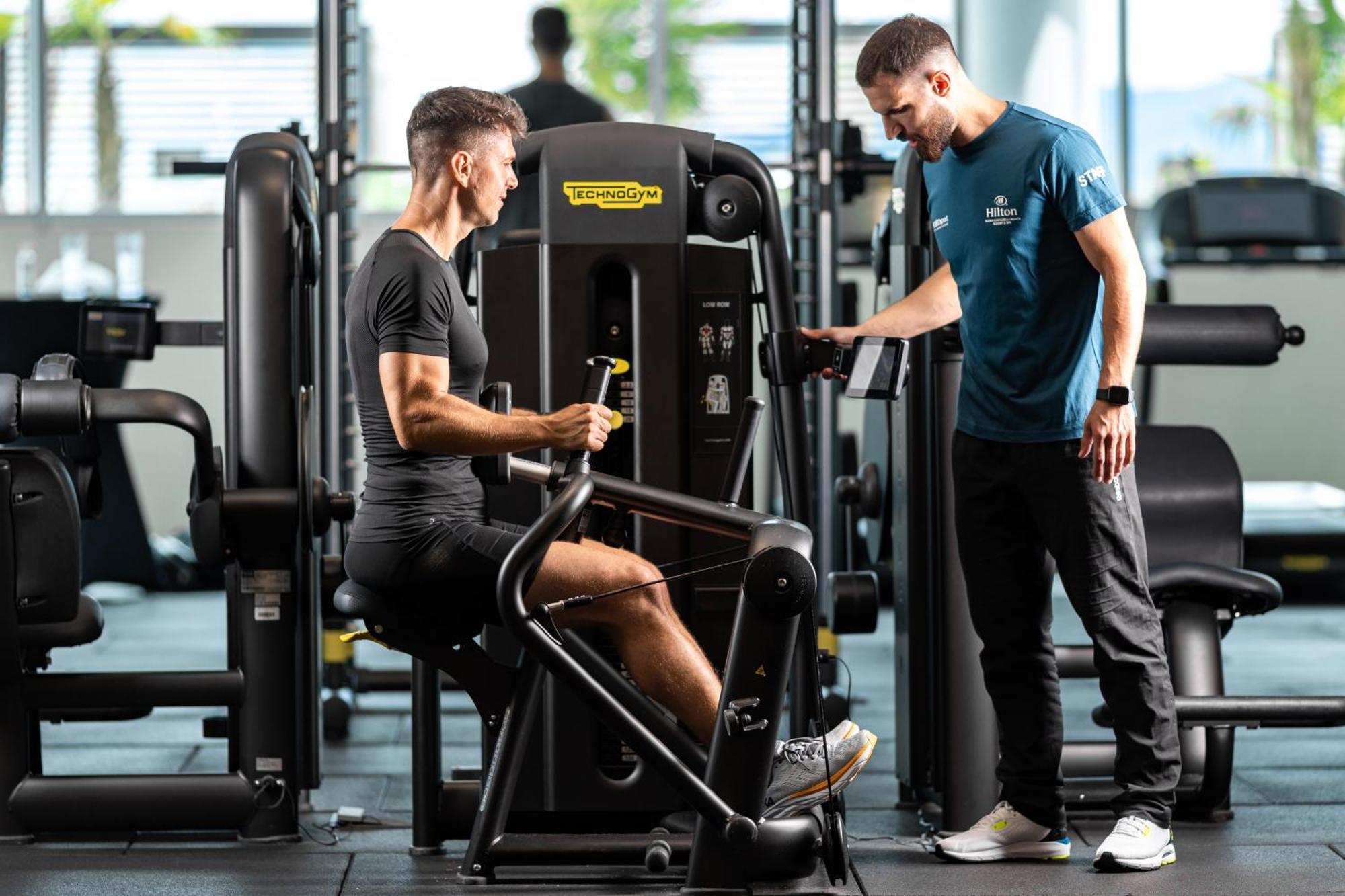 Hilton Rijeka Costabella Beach Resort And Spa Exterior photo Personal trainer with a client