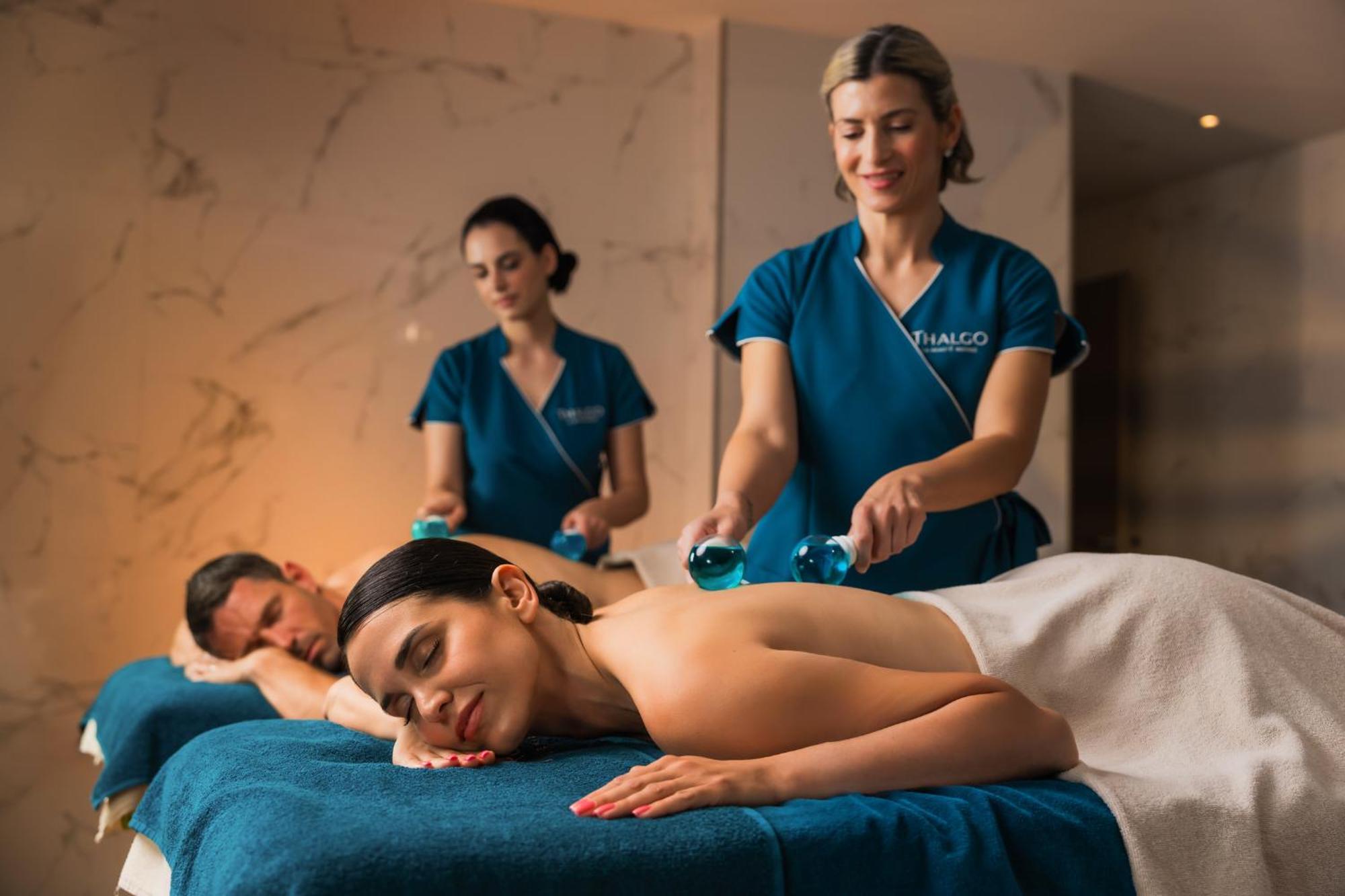 Hilton Rijeka Costabella Beach Resort And Spa Exterior photo A massage therapist performing a massage